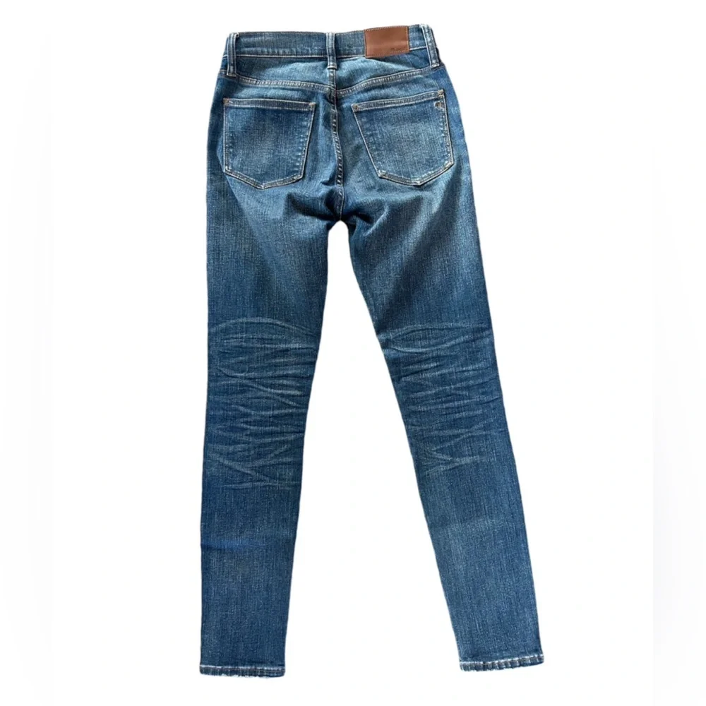 Madewell | Women’s medium blue distressed high rise skinny skinny jeans, size 25